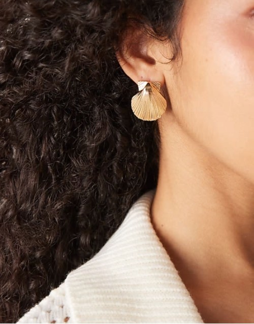 statement shell drop earrings in gold